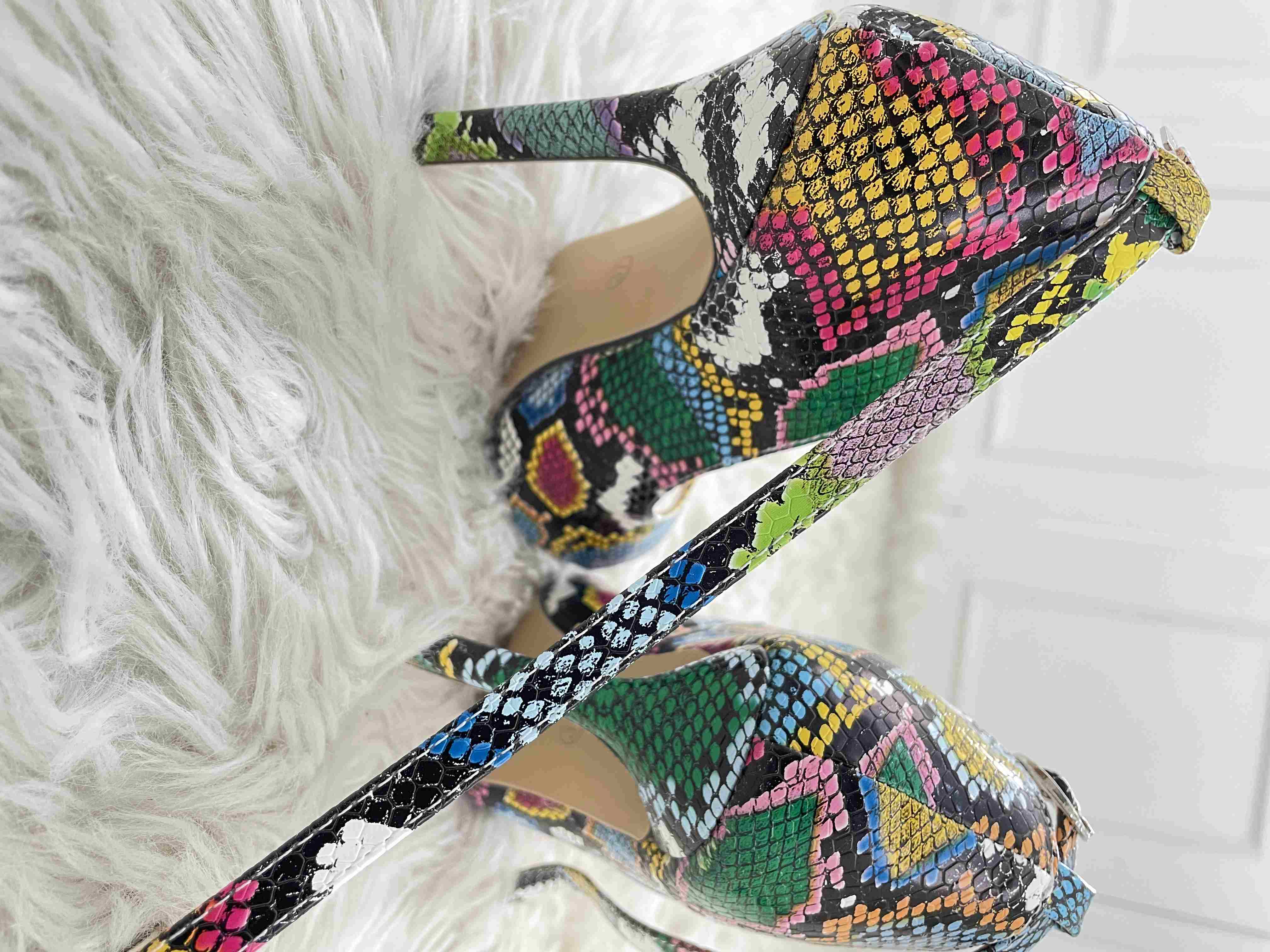 snakeskin closed toe heels