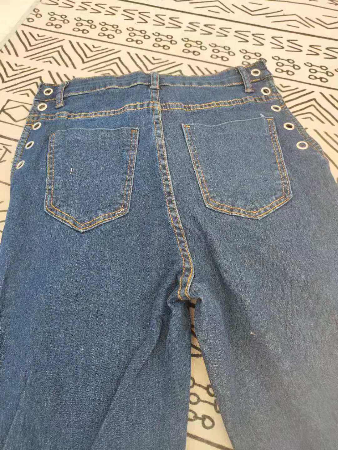 Letter Print Eyelet Chain LaceUp Skinny Jeans