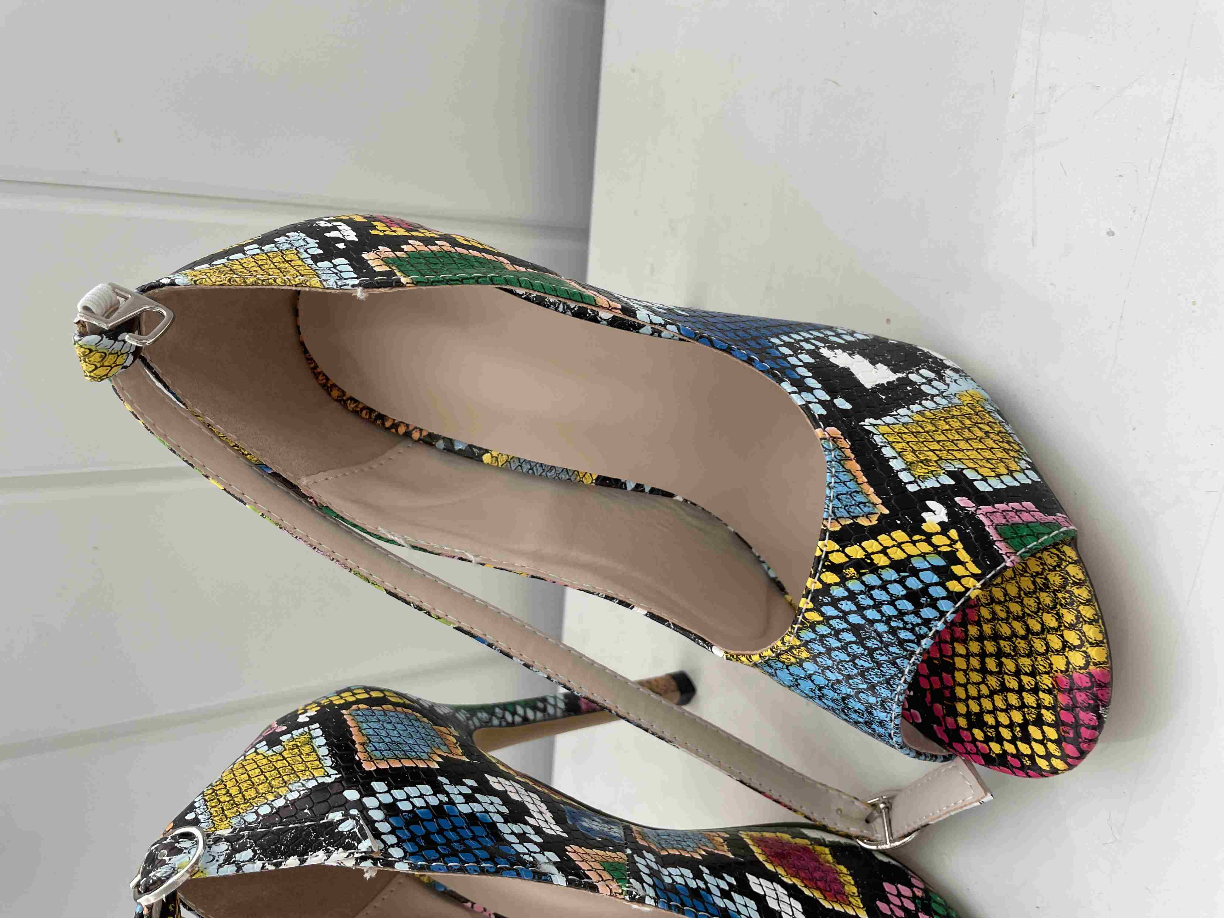 snakeskin closed toe heels