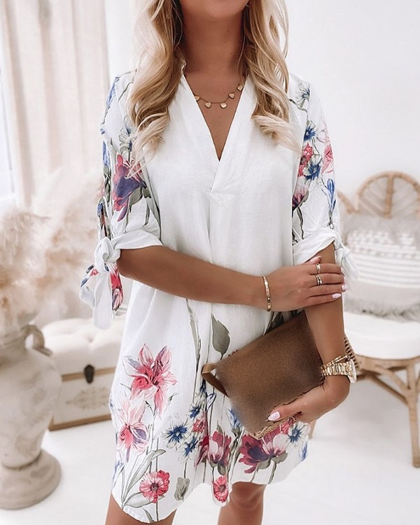 Kukkakuvioinen puolihihainen sidottu yksityiskohtainen mekko