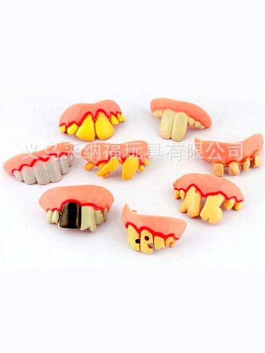 Halloween-toimittajan rekvisiitta hauskoja pukuja tekohampaiden takkahammastarvikkeita Aprillipäivän lelu