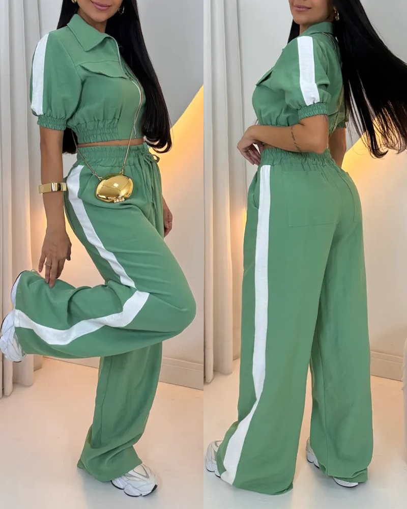 

Ensemble 2 pièces : crop top à col rabattu, poches à rabat zippées, ourlet extensible et pantalon large à taille élastiquée avec cordon de serrage. Style décontracté avec bande contrastée sur les côtés., Green