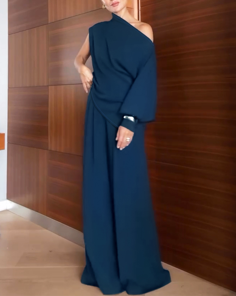 

Ensemble 2 pièces : haut asymétrique à col en V et manches lanternes fendues sur le côté, et pantalon large à jambes plissées sur le côté, boutonné et zippé., Purplish blue