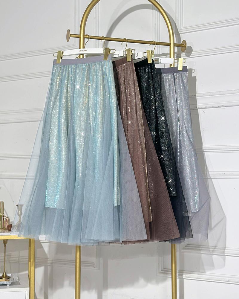 

Falda de talle alto en forma de A con parche de malla transparente, Lighted blue