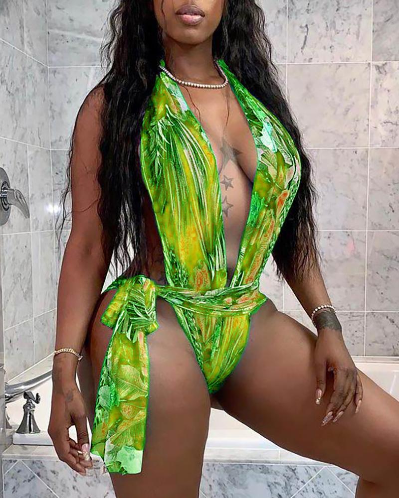 Traje de baño de una pieza con cuello halter y estampado tropical