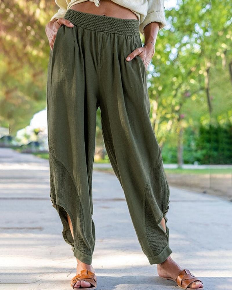 Pantalones con cintura elástica y corte lateral