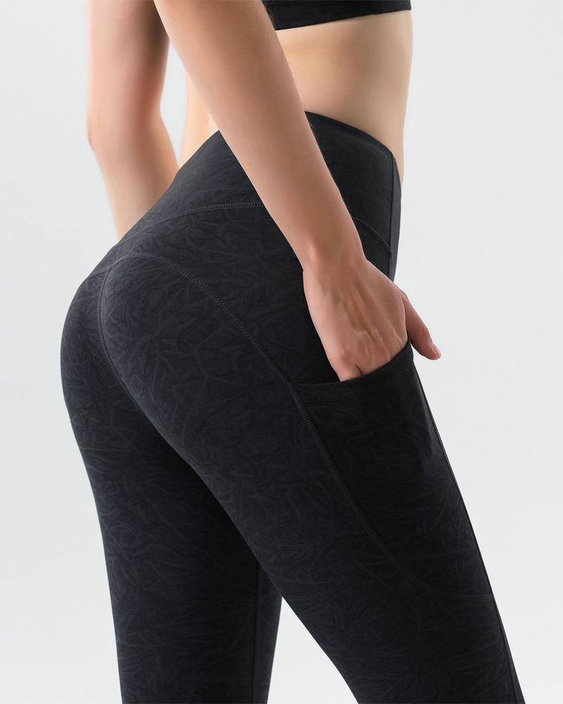 

Embossed Design Side Pocket Butt Lift Leggings, Black
