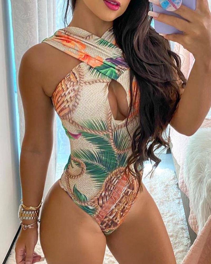 Bañador de una pieza con estampado tropical y escote halter en la parte delantera