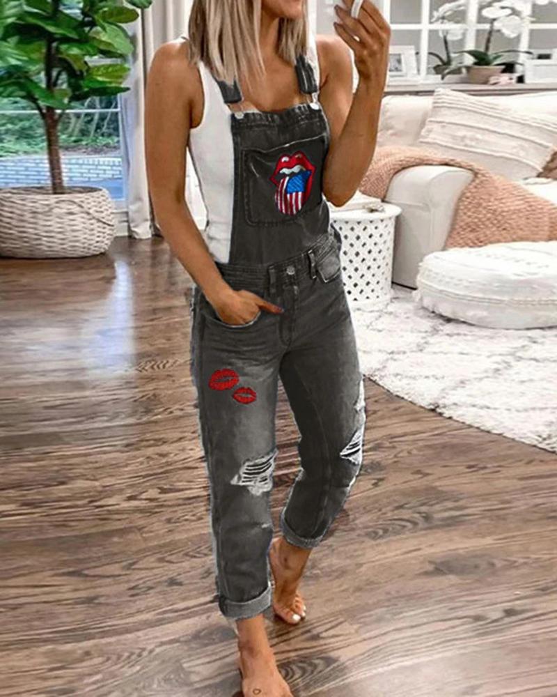 

Lip Flag Print Ripped Denim Suspender Jumpsuit, Black
